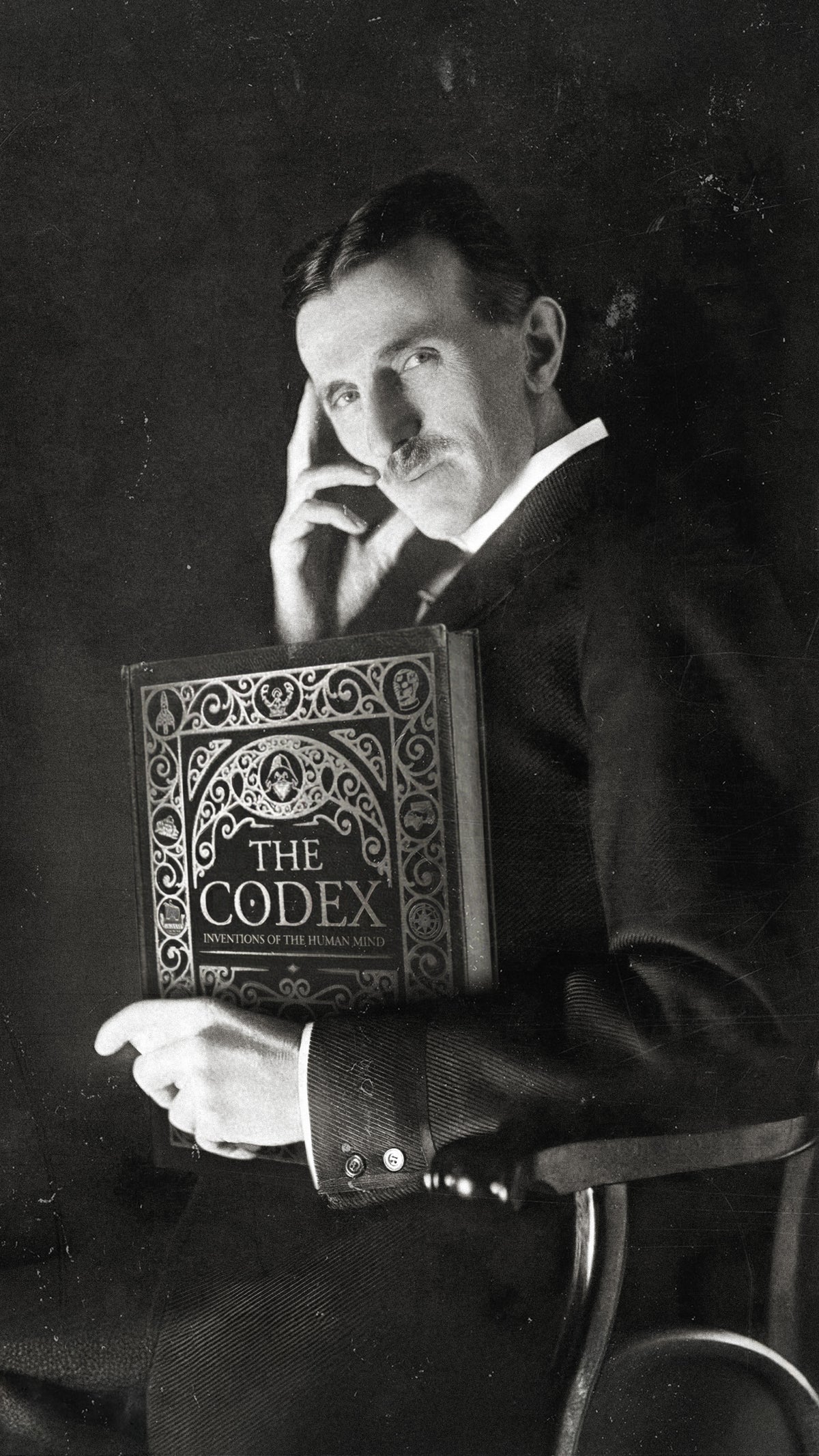 Black-and-white image of Nikola Tesla holding The Codex: Inventions of the Human Mind illustrated book, connecting electrical invention, engineering history, and great thinkers